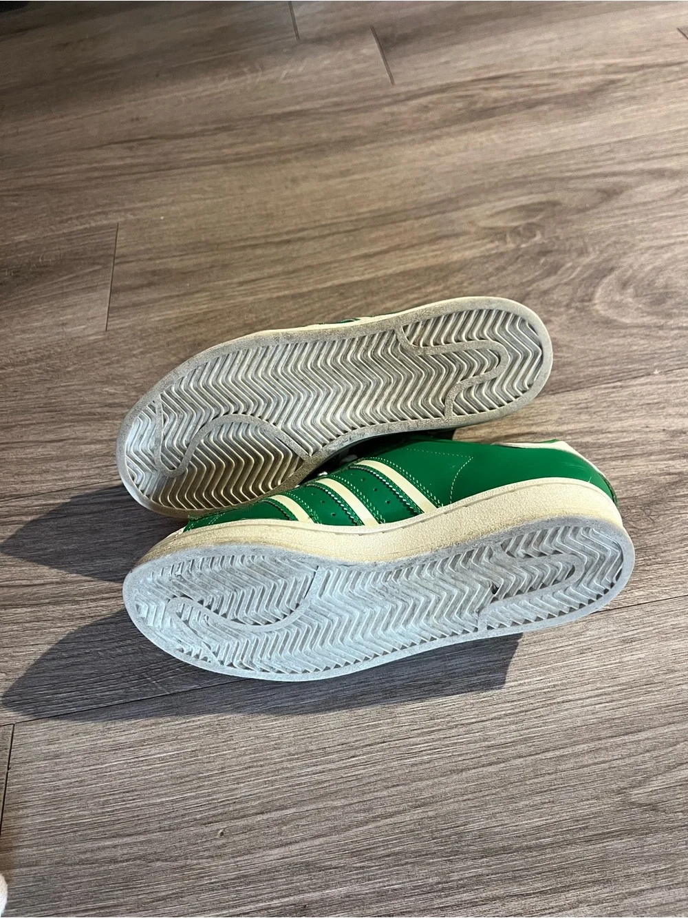 adidas women’s Green and White Superstar Sneakers with Red Logo